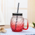 Clear glass pineapple-shaped water cup mason jar with handle and straw