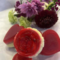 Two bars of rose handmade soap with delicate pink color and floral design showcasing natural rose essence and luxury skincare benefits