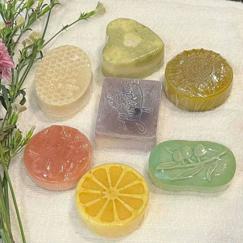 Collection of seven handmade sensitive and normal skin soap bars with natural ingredients and essential oils